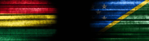 Bolivia Och Salomonöarna Flaggor Svart Bakgrund — Stockfoto