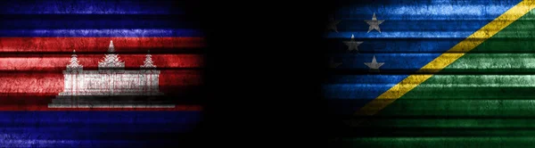 Cambodia and Solomon Islands Flags on Black Background
