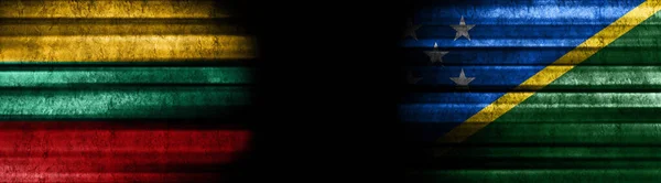 Lithuania and Solomon Islands Flags on Black Background