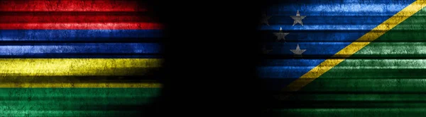Mauritius and Solomon Islands Flags on Black Background