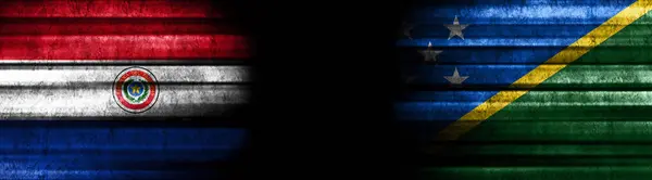 Paraguay and Solomon Islands Flags on Black Background