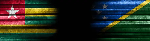 Togo and Solomon Islands Flags on Black Background