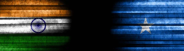India and Somalia Flags on Black Background