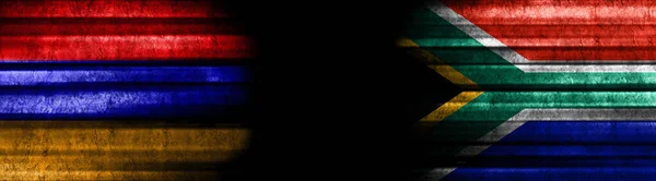 亚美尼亚和南非关于黑人背景的旗帜 — 图库照片
