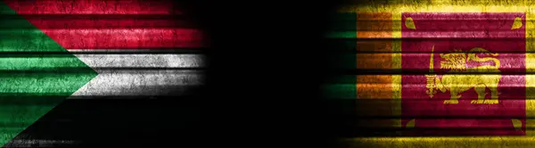 黒い背景にスーダンとスリランカの旗 — ストック写真