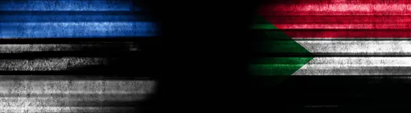 Estland Sudan Vlaggen Zwarte Achtergrond — Stockfoto