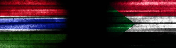 冈比亚和苏丹黑色背景旗 — 图库照片