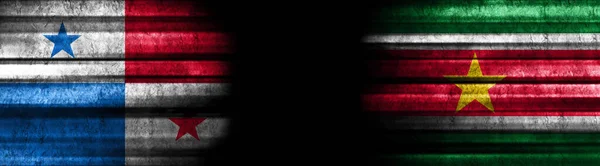 Panama and Suriname Flags on Black Background