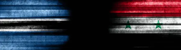 博茨瓦纳和叙利亚黑色背景旗 — 图库照片