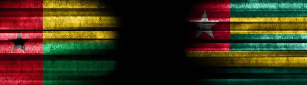 Guinea Bissau Togo Zászlók Fekete Háttér — Stock Fotó