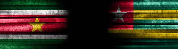 Suriname and Togo Flags on Black Background