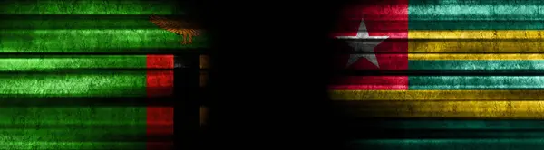 赞比亚和多哥黑色背景旗帜 — 图库照片