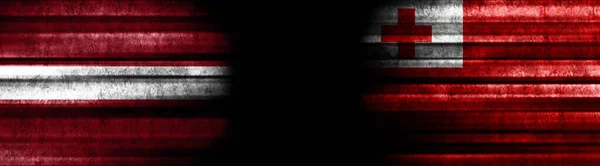 Letland Tonga Vlaggen Zwarte Achtergrond — Stockfoto