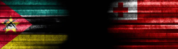 Mozambique Tonga Flags Black Background — Stock Photo, Image