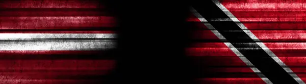Lettország Trinidad Tobago Zászlók Fekete Háttér — Stock Fotó