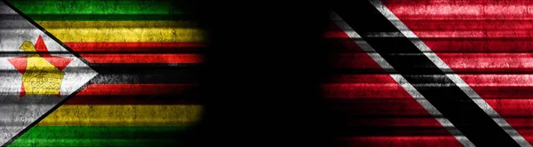 Zimbabwe Trinidad Tobago Flags Black Background — Stock Photo, Image