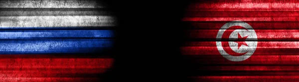 Russia and Tunisia Flags on Black Background