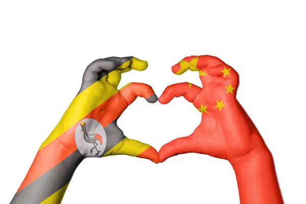 乌干达中国心 手手势造心 收割之路 — 图库照片