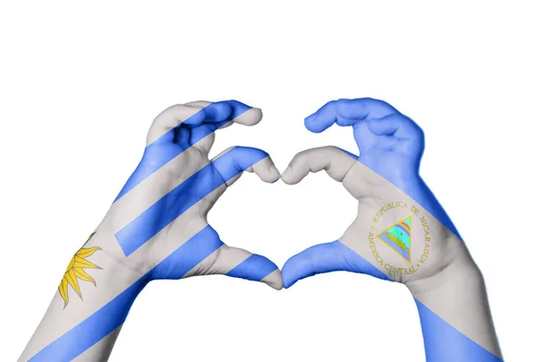 Uruguay Nicaragua Heart Hand Gesture Making Heart Clipping Path — Stock Photo, Image