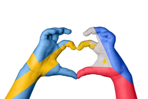 瑞典菲律宾心 手手势造心 收割之路 — 图库照片