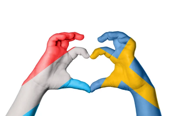 stock image Luxembourg Sweden Heart, Hand gesture making heart, Clipping Path