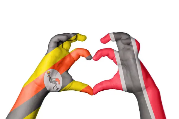 乌干达特立尼达和多巴哥心脏 手举着手制造心脏 开辟道路 — 图库照片