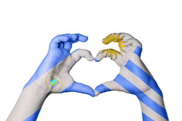 Nicaragua Uruguay Heart Hand Gesture Making Heart Clipping Path — Stock Photo, Image