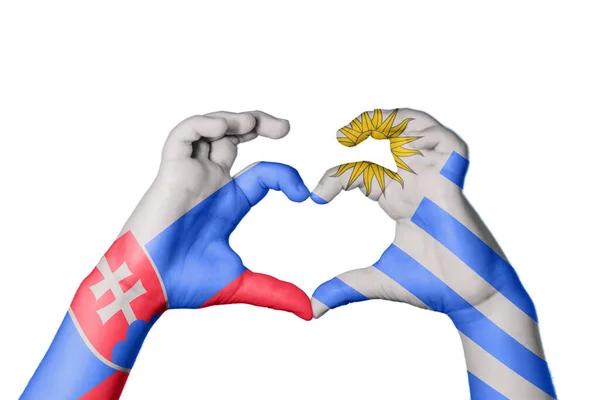 斯洛伐克乌拉圭心脏 手举着手制造心脏 修整道路 — 图库照片
