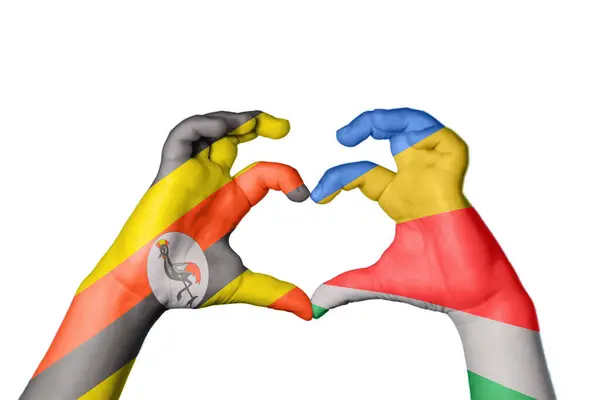 乌干达Seychelles Heart Hand Gesture Making Heart Clipping Path — 图库照片