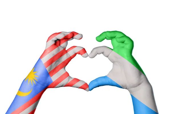 马来西亚Sierra Leone Heart Hand Gesture Making Heart Clipping Path — 图库照片