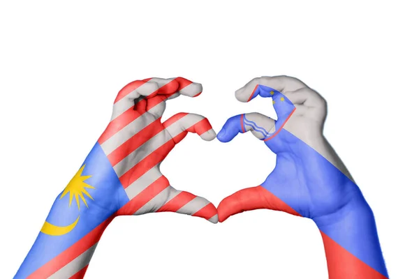 Малайзия Slovenia Heart Hand Gesture Making Heart Clipping Path — стоковое фото