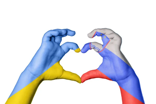 Stock image Ukraine Slovenia Heart, Hand gesture making heart, Clipping Path