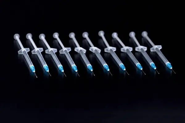 stock image Medical Syringes Needle on Black Background, Close up Syringe, Health care concept