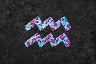 Kova burcu, Astrolojik Sembol