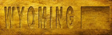 Grunge Altın Doku Üzerine Wyoming Haritası ve Metni