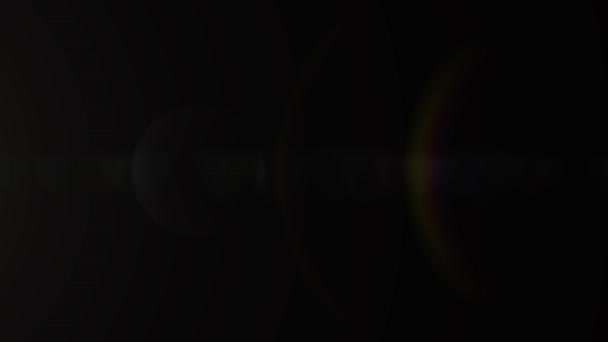 发光耀斑 光学透镜耀斑效应 叠加光效应 在黑色上发光 全高清4K — 图库视频影像