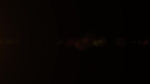 发光耀斑 光学透镜耀斑效应 叠加光效应 在黑色上发光 全高清4K — 图库视频影像