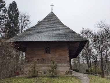 the open-air museum of traditional wooden architecture in the national park in Ukraine, wooden church view