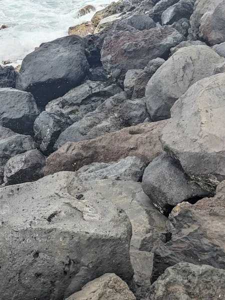 rocks in the beach of the mediterranean sea 