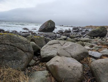 Sea breeze flows through rocky shore