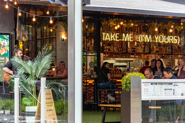 stock image Melbourne, Victoria / Australia - 11/03/2019 Melbourne city's centre is the modern Federation Square development, with plazas, bars, and restaurants by the Yarra River.