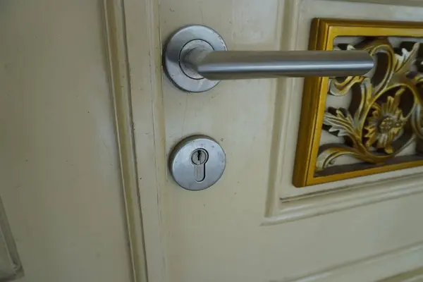 Door handles and house door locks