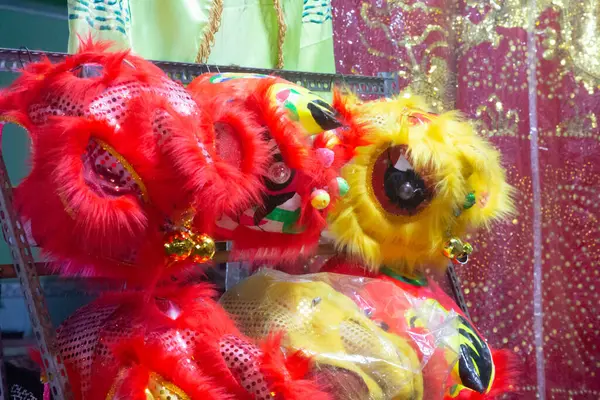 The colorful little lion head serves lion dances at the store on Luong Nhu Hoc street in Mid-autumn, Vietnam