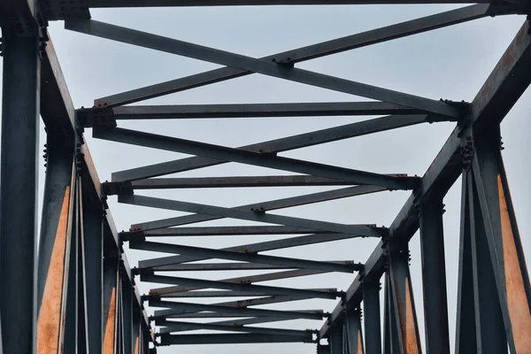 stock image the black metal railings of a bridge