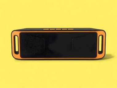 Sarı arkaplanda kablosuz taşınabilir bluetooth hoparlörü