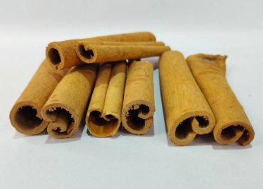Cinnamon Sticks Arrangement on the White Background