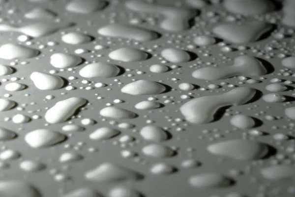 瓷砖地板上的水滴 地面水滴的特写照片 — 图库照片
