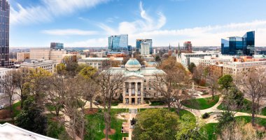 Drone panorama of the North Carolina State Capitol and Raleigh skyline clipart