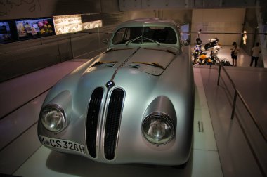 Munich, Germany - July 7 2022: Historic collection of BMW racing, sport, classic, concept cars and motorcycles. Interior of automobile museum. Permanent exhibition of first cars and electric concepts