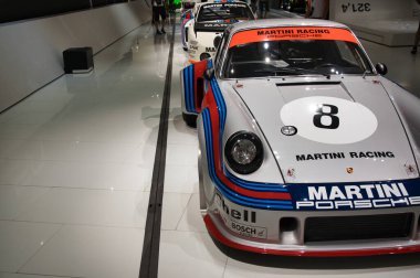 Stuttgart, Germany - July 5 2022: Historic collection of Porsche racing, sport and classic cars. Interior of Porsche automobile museum. Permanent exhibition of 911 targa, 961, Carrera coupe and others